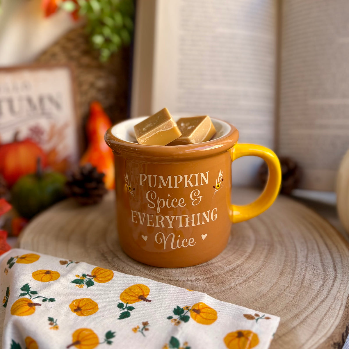 A la taza · Quemador de cerámica para wax melts